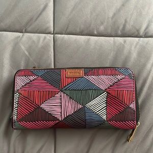 Fossil accordion wallet that is RFID protected.